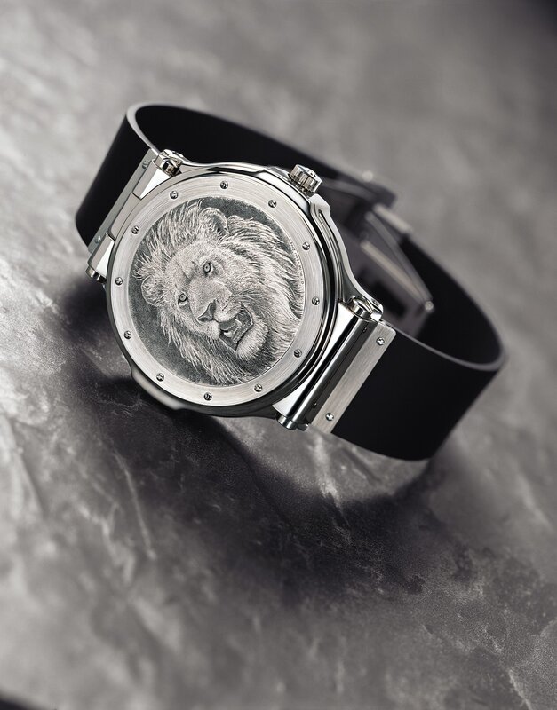 lion-engraved watch