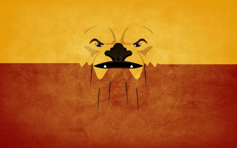 Lion's Face in Sand