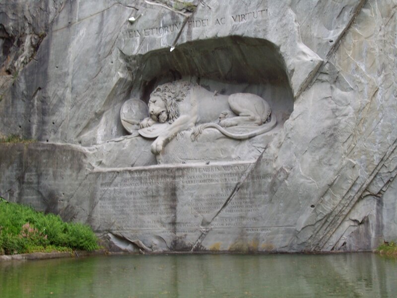 Lion sculpture in rock carving