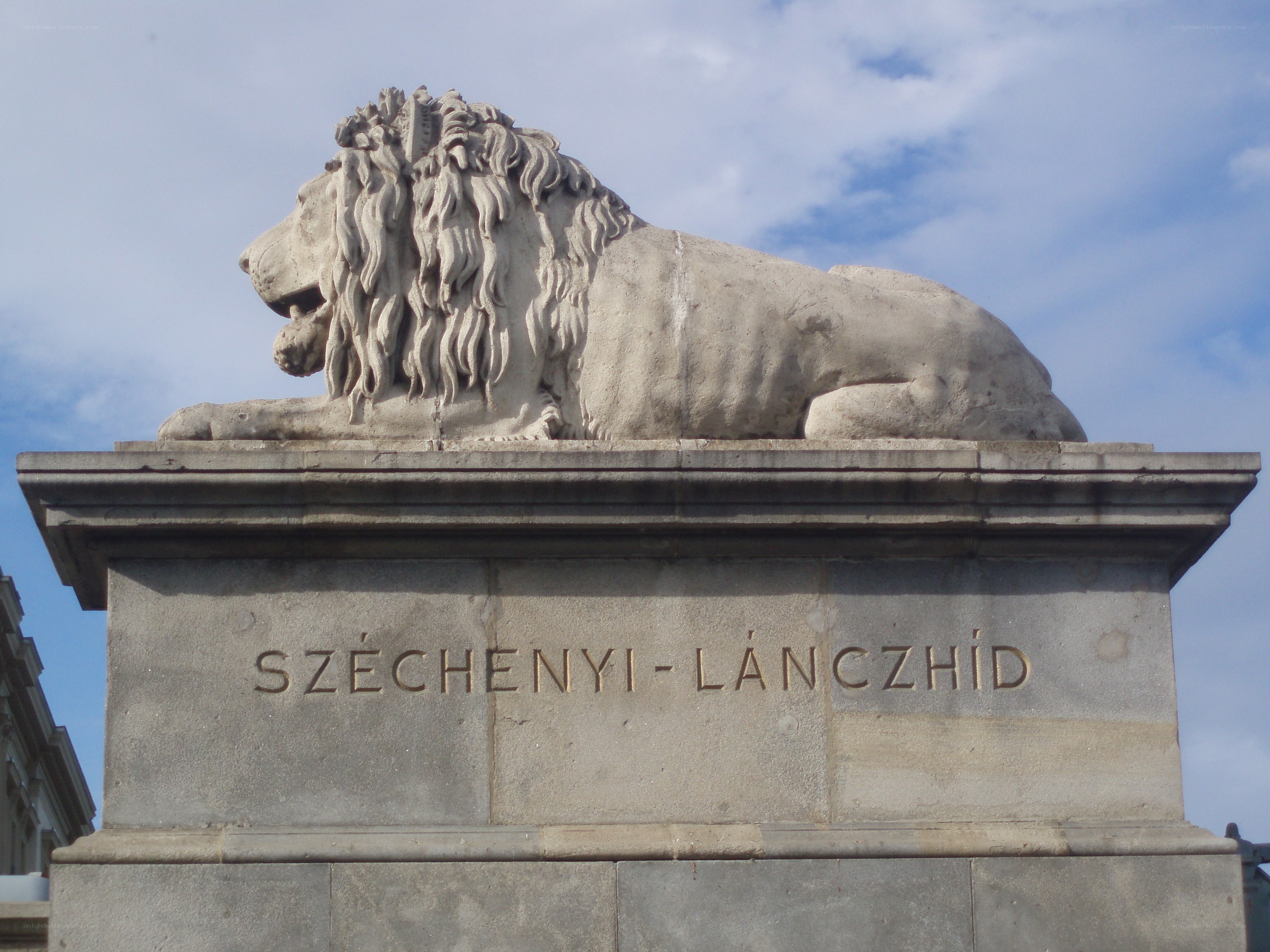 Lion statue on pedestal