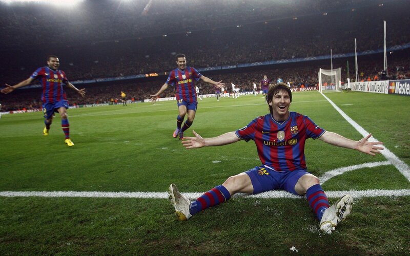 Lionel Messi celebrates on the field