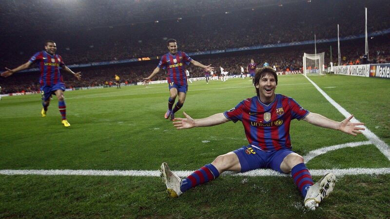 Lionel Messi celebrates on the field