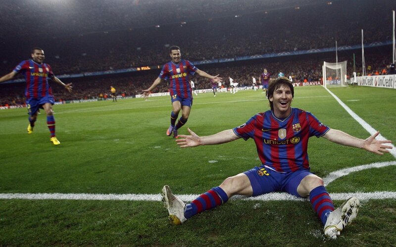 Lionel Messi celebrates on the field