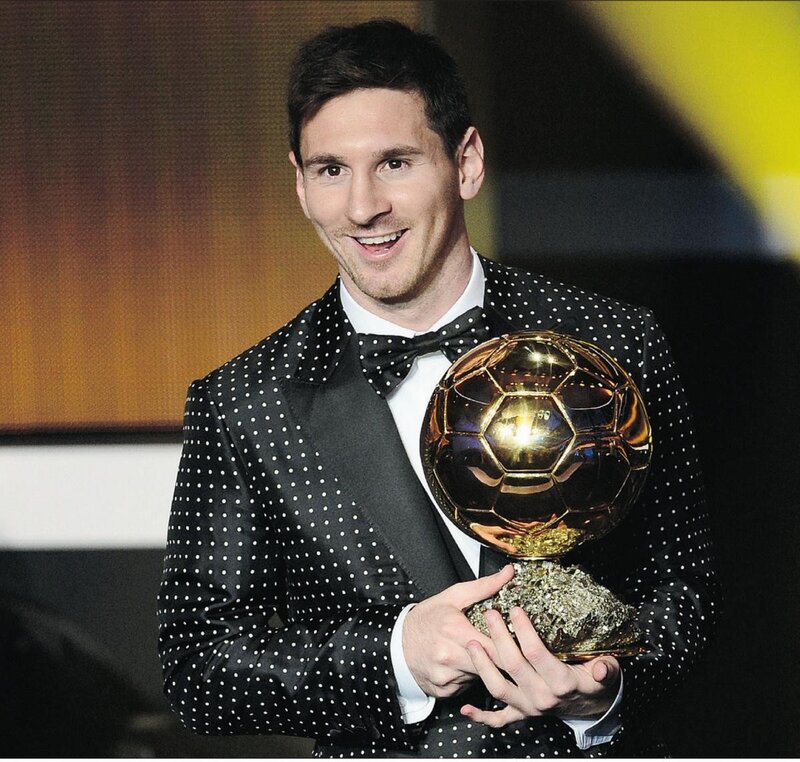 Lionel Messi with Ballon d'Or