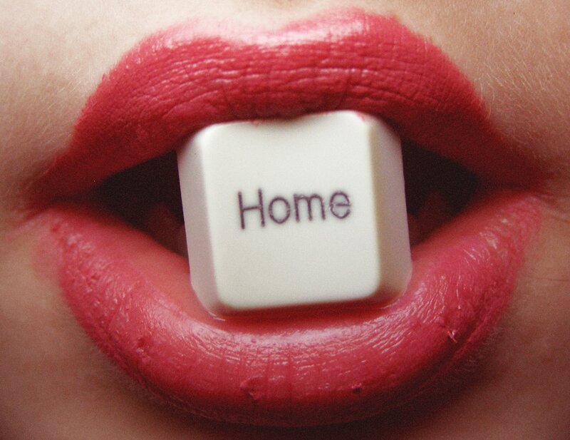 lips holding a keyboard key