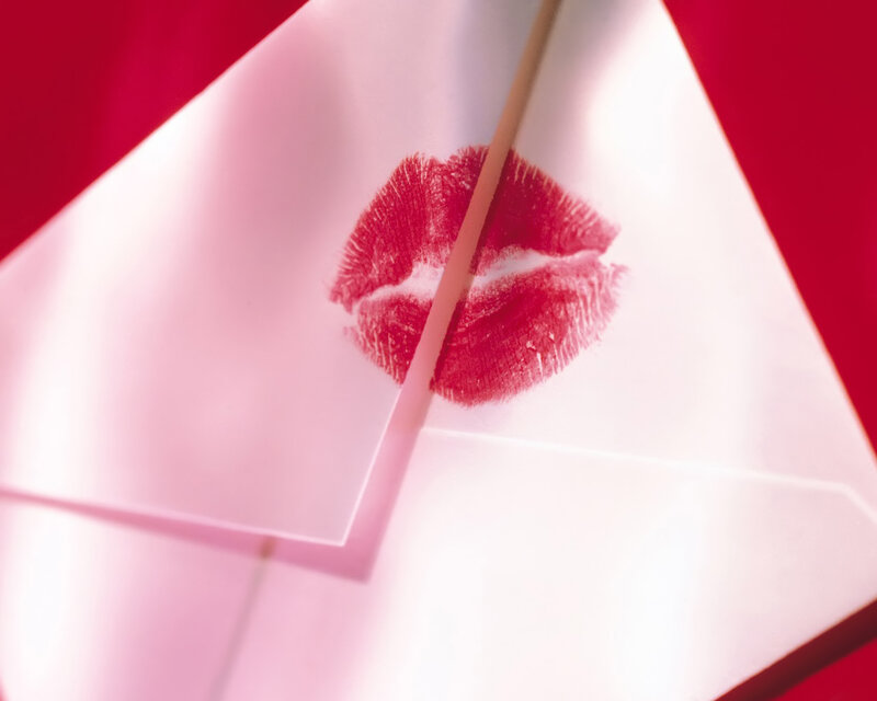 Lipstick kiss on envelope