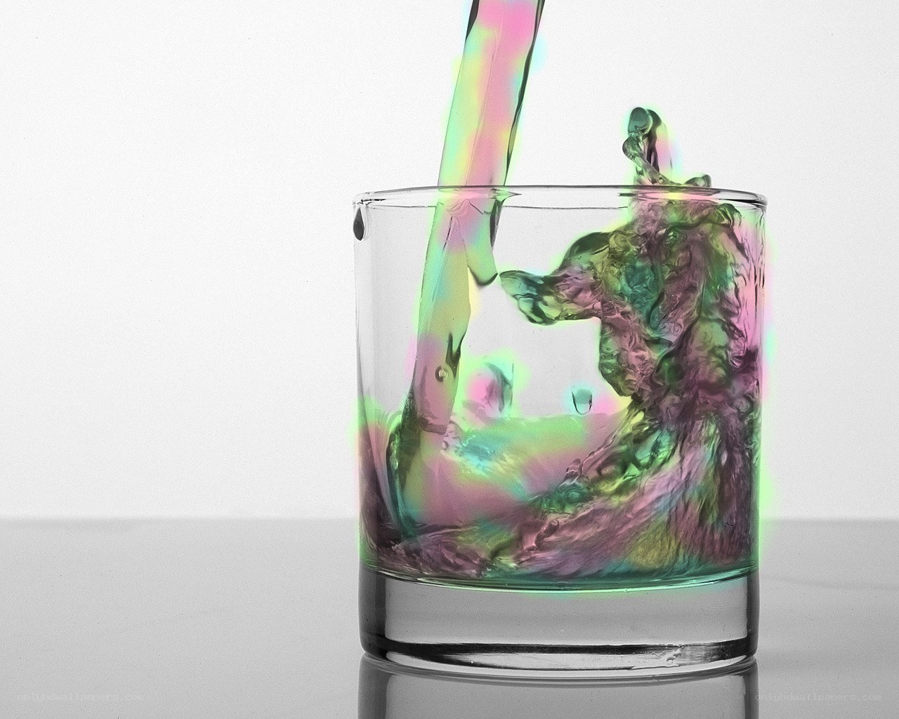 liquid being poured into a glass