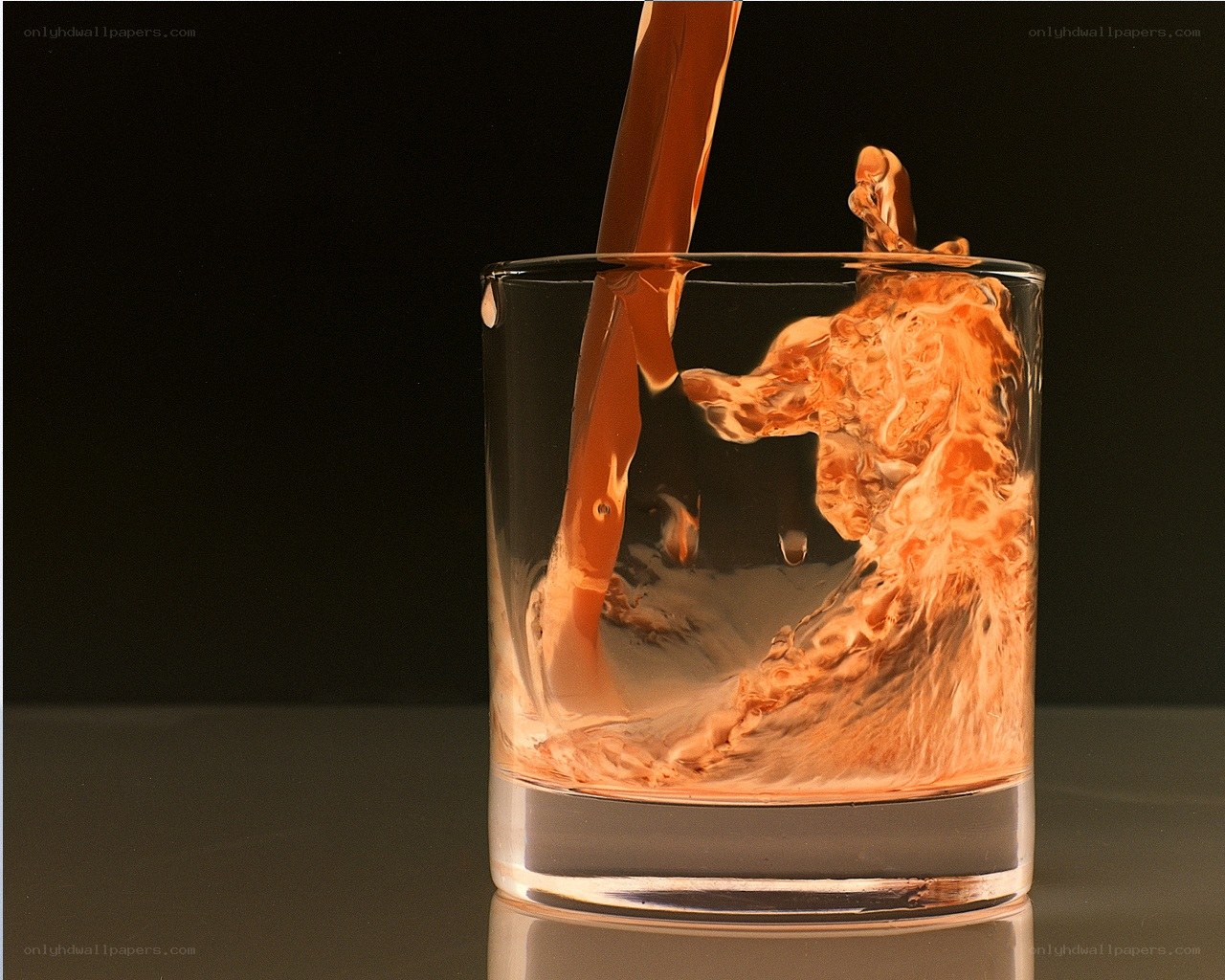 liquid being poured into glass