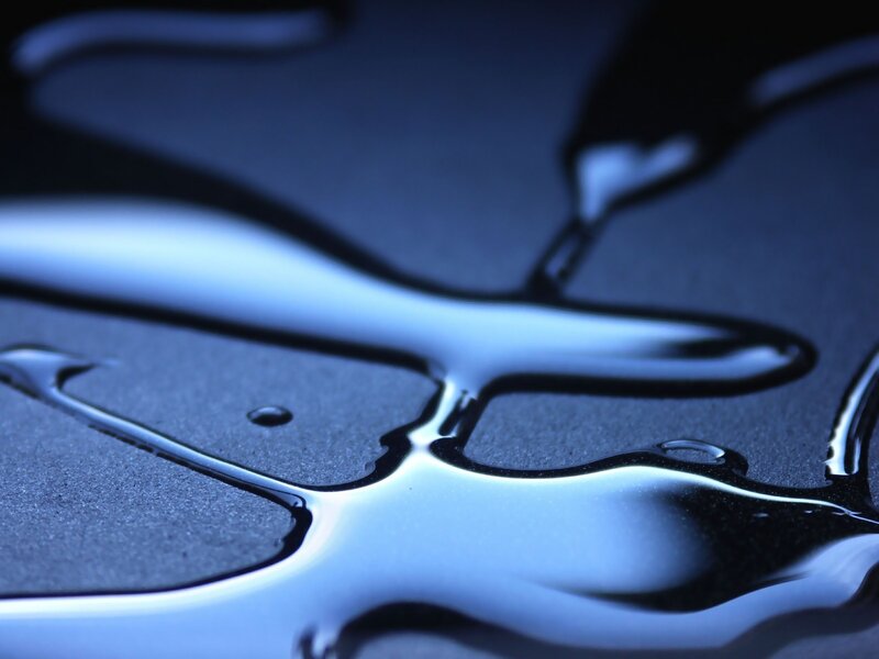 liquid on dark surface