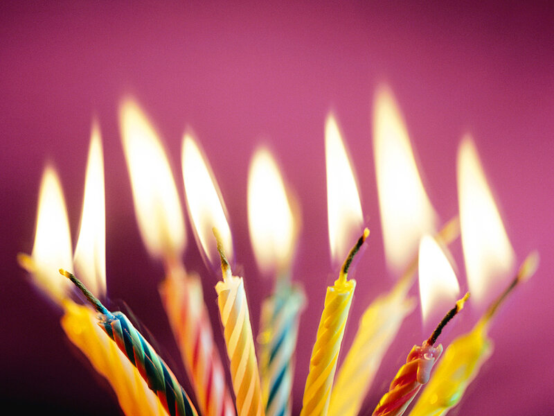 Lit Birthday Candles — Purple