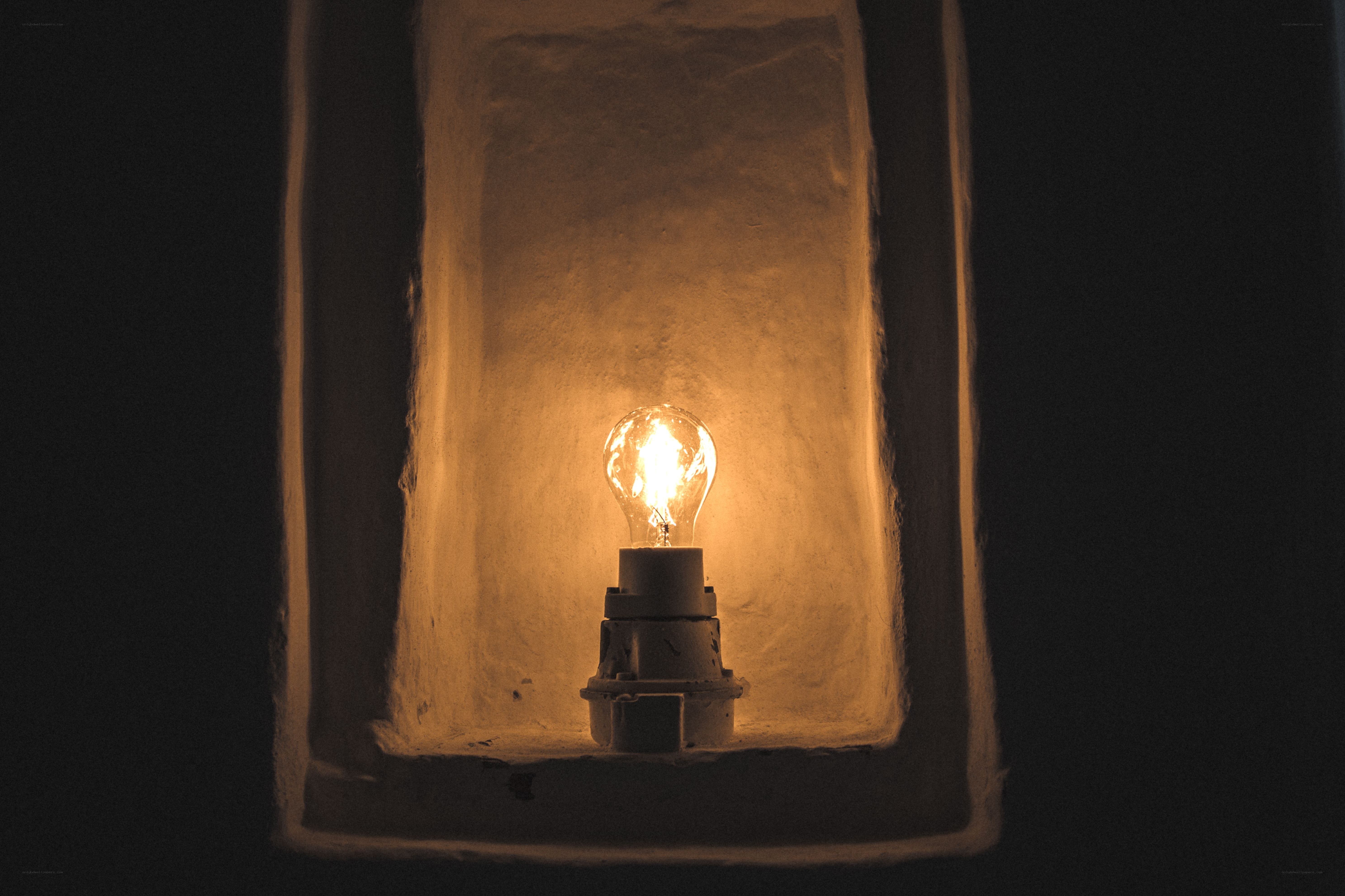 lit bulb in a niche