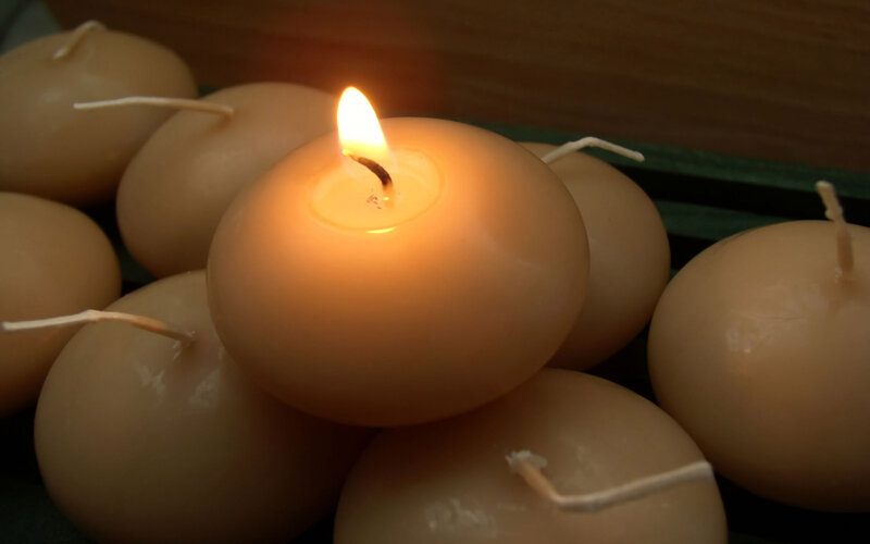 Lit Candle Among Candles — Yellow