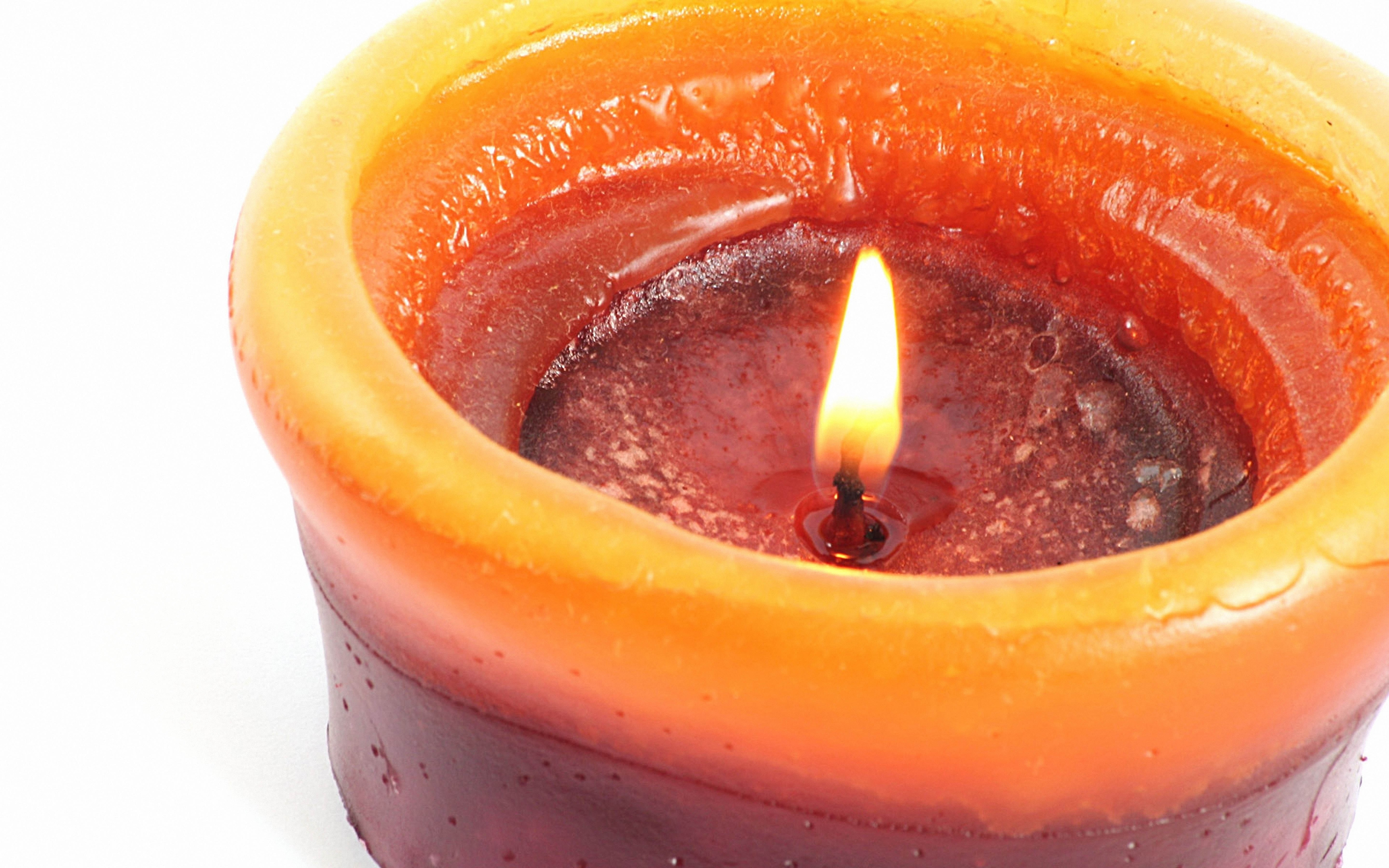 lit candle in a holder