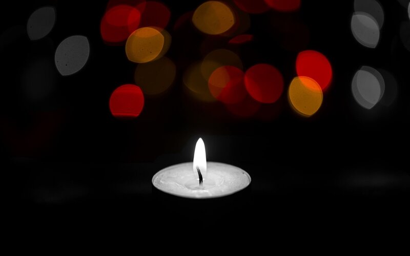 Lit Candle in Darkness — Black, Somber