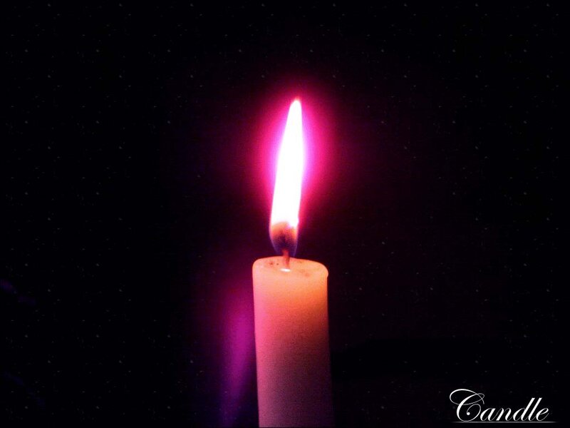 Lit Candle in Darkness — Black
