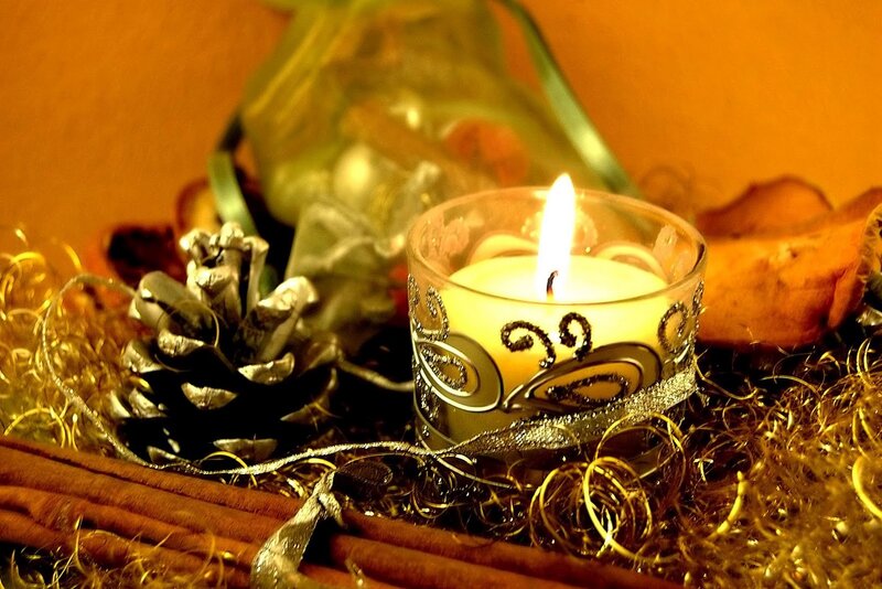 Lit Candle in Glass Holder — Golden