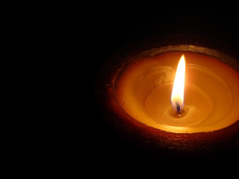 Lit Candle in Holder — Black, Calm