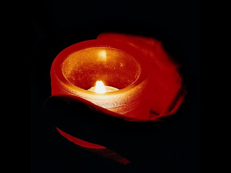 Lit Candle in Holder — Red