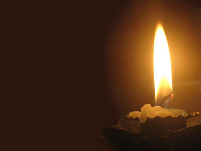 Lit Candle in Holder — Yellow, Dramatic