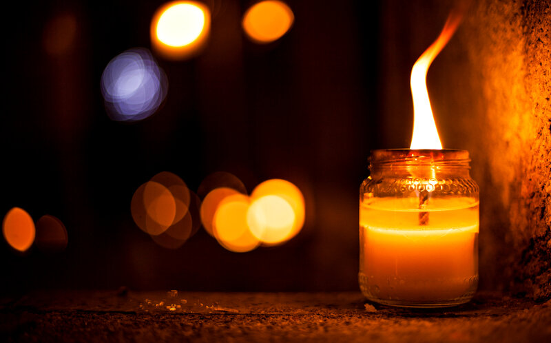 Lit Candle in Jar — Orange, Warm