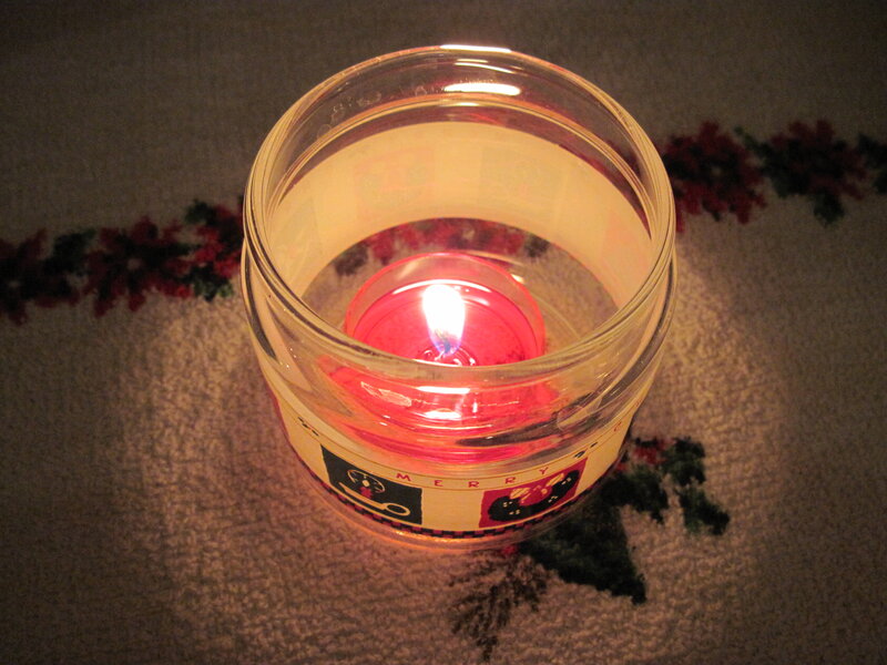 Lit Candle in Jar