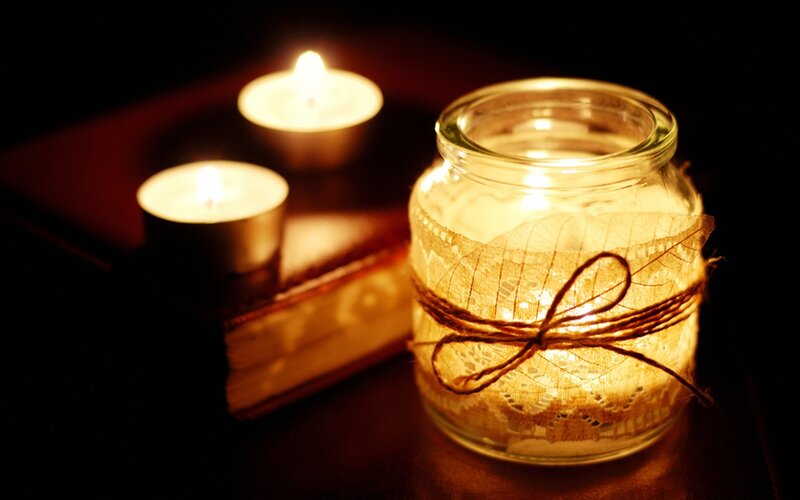 Lit Candle in Jar — Yellow