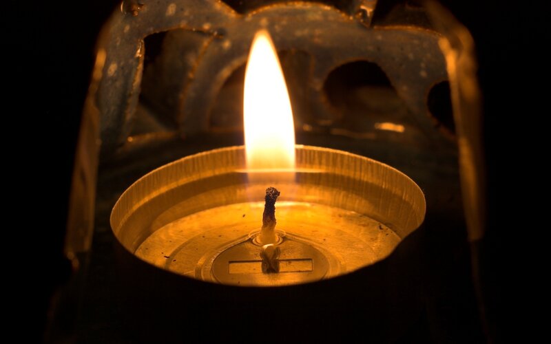 lit candle in lantern