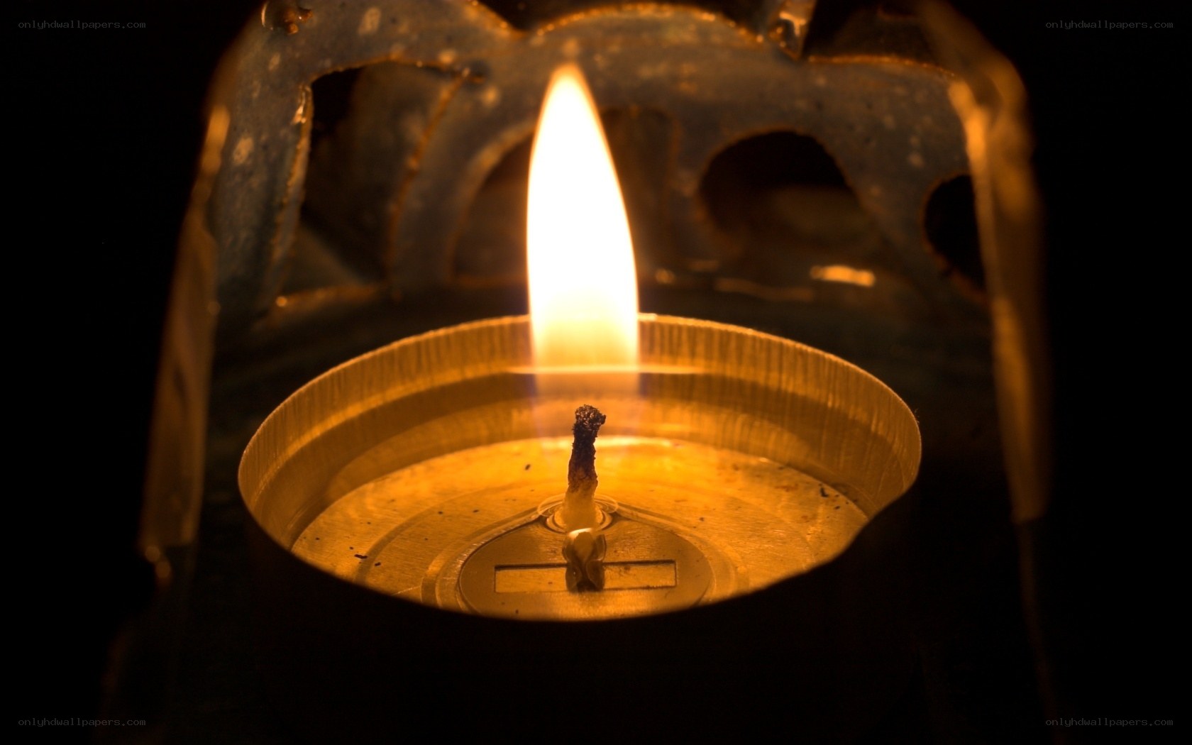 lit candle in lantern