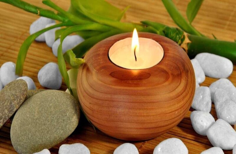Lit Candle in Wooden Holder — Brown