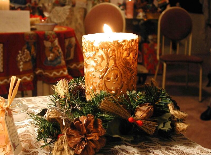 Lit Candle in Wreath