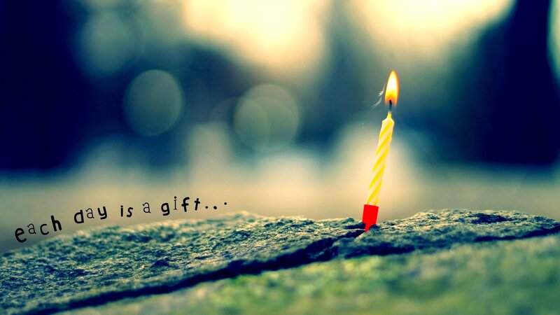 Lit Candle on Stone — Yellow