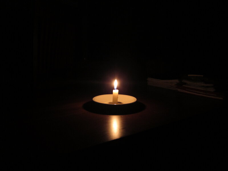 Lit Candle on Table — Black, Calm