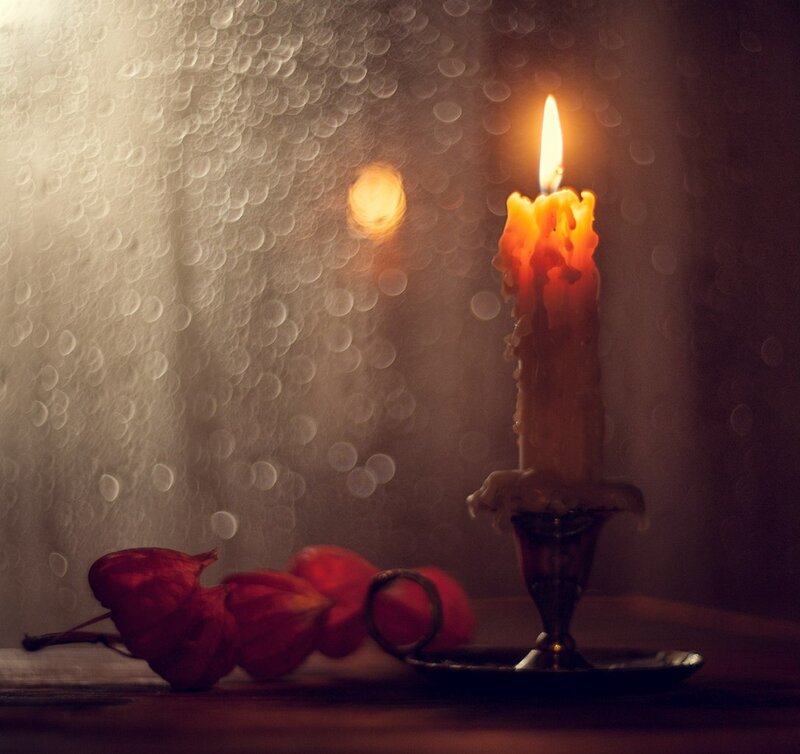 Lit Candle on Table — Red