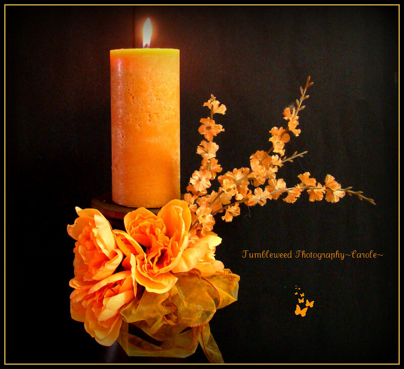 Lit Candle with Flowers