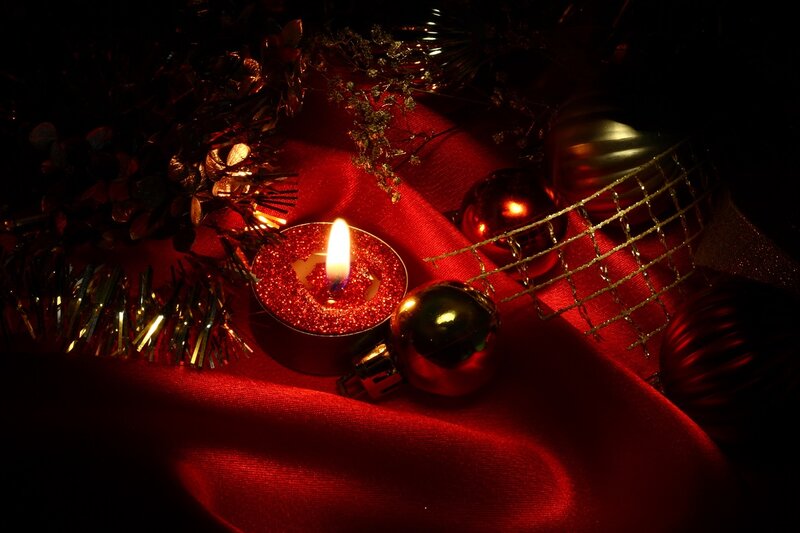 Lit Candle with Ornaments — Red, Dramatic, Night