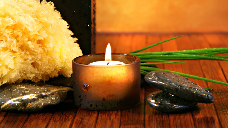 Lit Candle with Spa Items