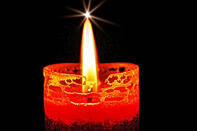 lit candle with starburst effect