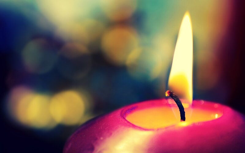 lit candle with warm glow