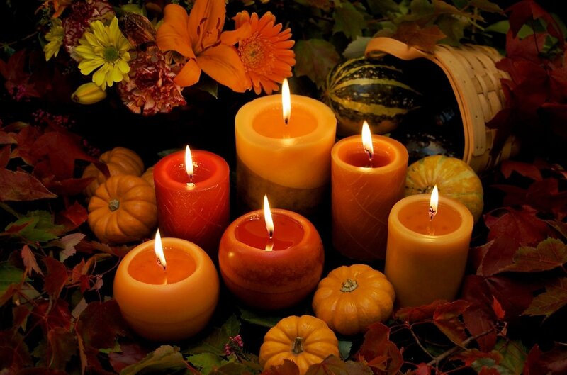 Lit Candles and Pumpkins