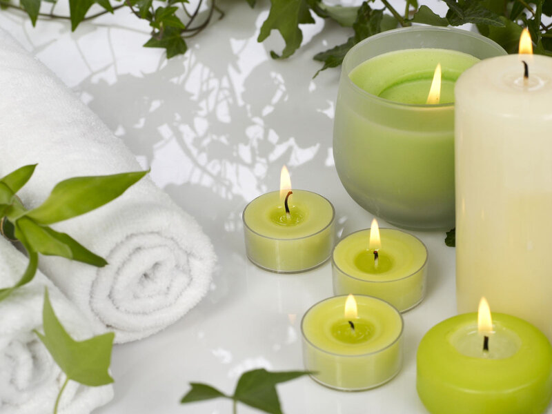 Lit Candles and Towel