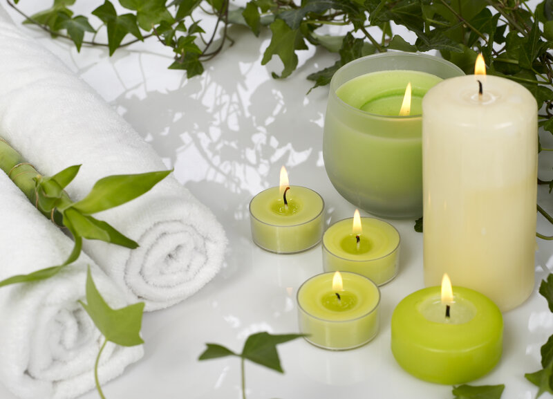 Lit Candles and Towels