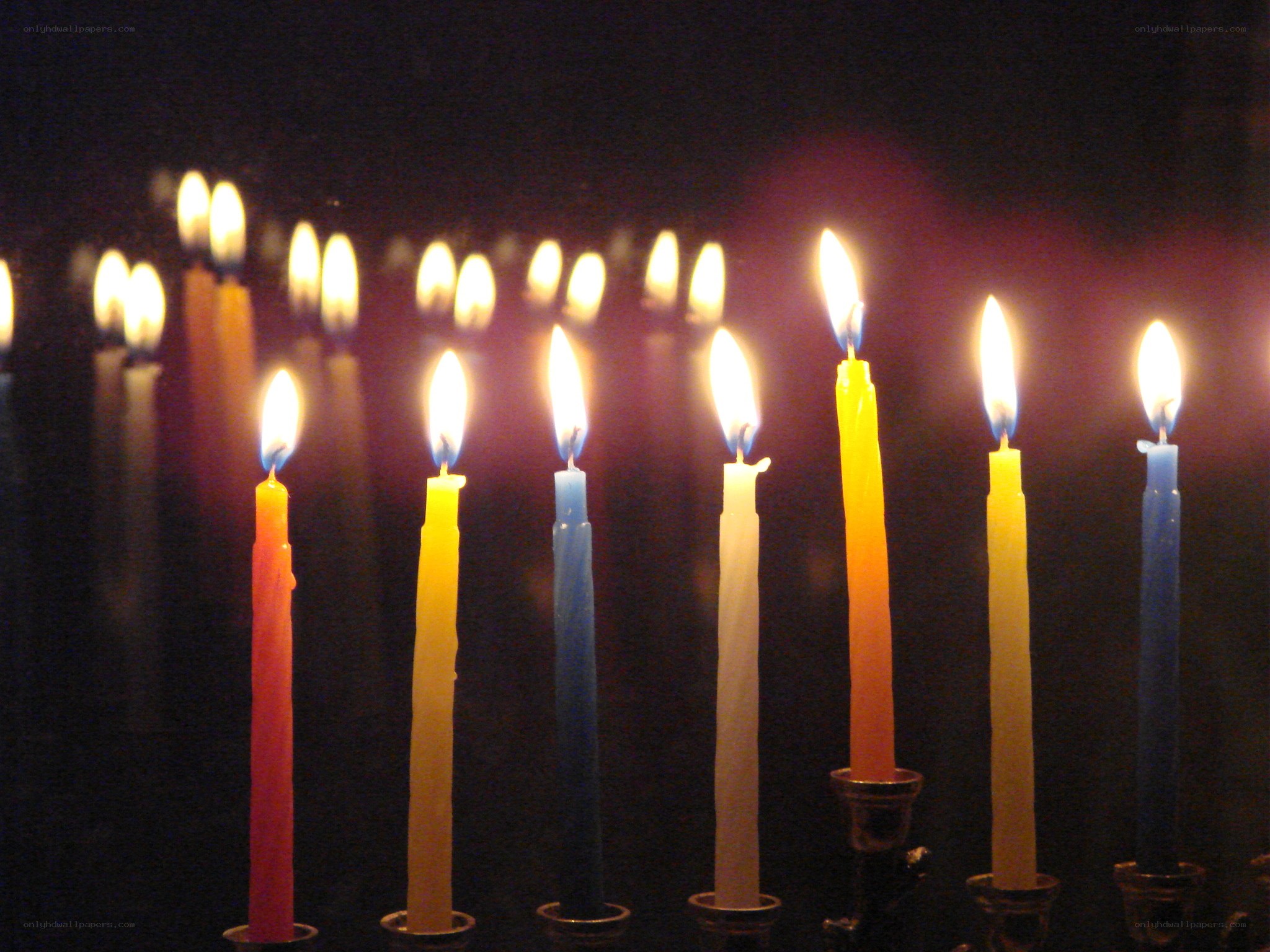 lit candles in a row