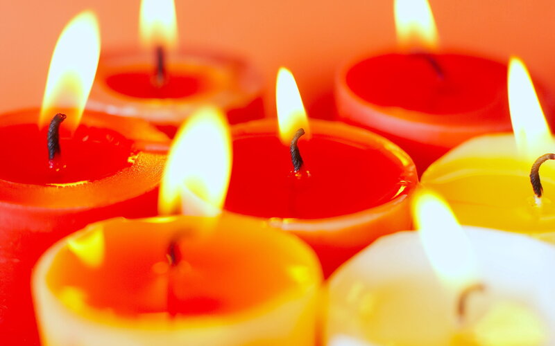 Lit Candles in Close-up