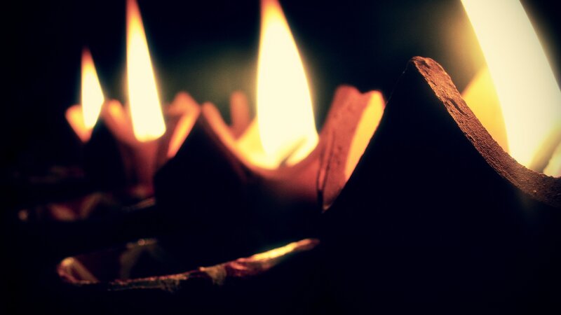 Lit Candles in Dark — Black, Dramatic