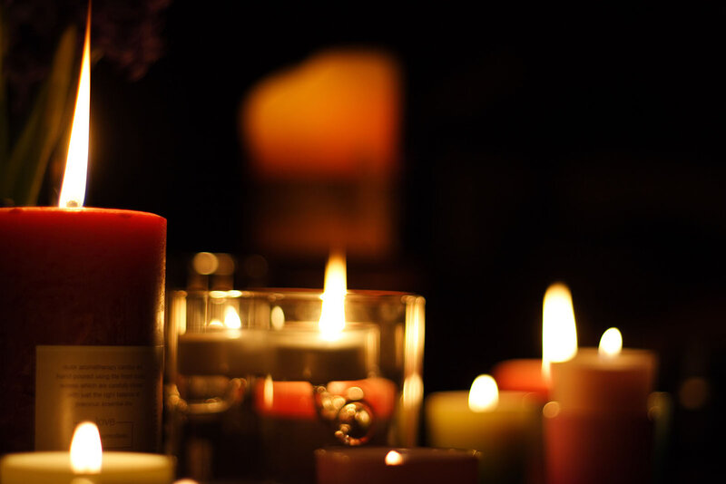 Lit Candles in Dark — Red