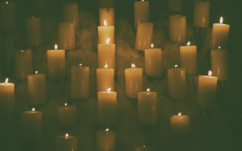 Lit Candles in Dark — Yellow, Somber