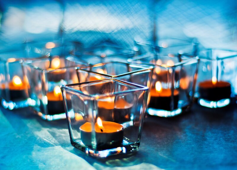 Lit Candles in Glass Holders — Blue