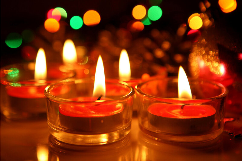 Lit Candles in Glass Holders — Red