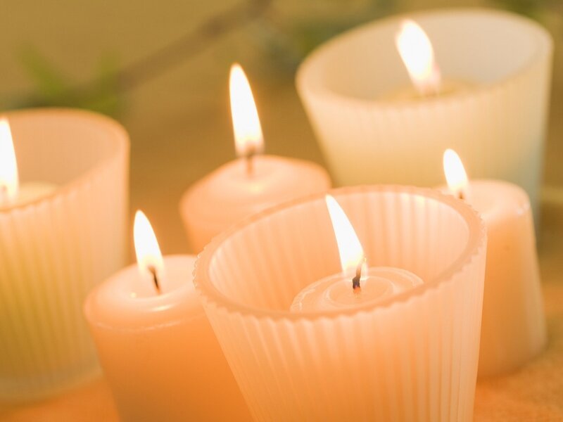 Lit Candles in Holders