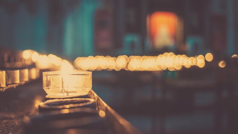 Lit Candles in Row — Yellow